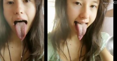 Petite Asian Shows Off She Has A Long Tongue