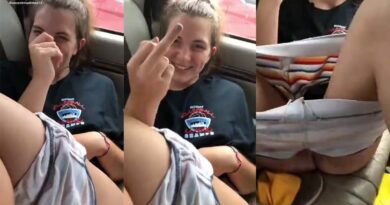 Girl in the car, she lowers her shorts and they touch her pussy