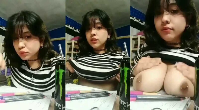 While she was doing her homework, she shows that she has very large and developed breasts.