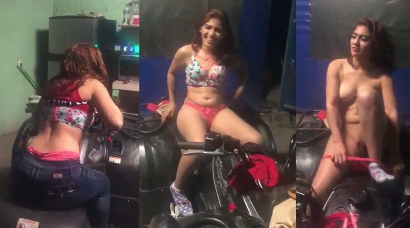 Drunk Latina girl strips naked in the motorcycle shop